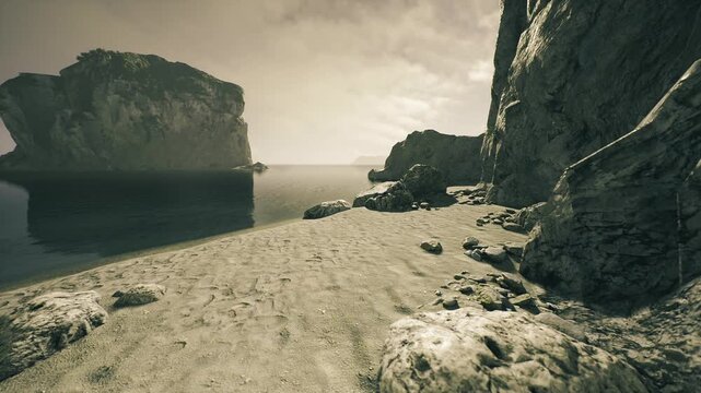 Coastal canyon bathed in golden light showing rugged cliffs, sandy shore and warm atmospheric glow ideal for editorial travel, sunset scouting and cinematic