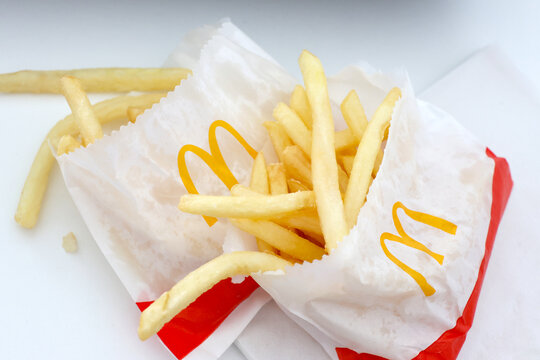 Wroclaw, Poland, April 12, 2026: Crispy Fast Food Experience: Fresh McDonald's French Fries in Classic Packaging