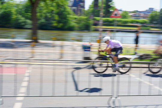 Cyclist in sportswear and sport helmet riding road bike isolated on free png background. Concept of sport, triathlon, competition, tournament, championship and speed.