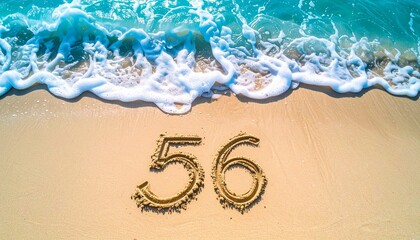 Fototapeta premium A beach themed copy space background displaying the number 56 drawn in smooth sand, tropical ocean colors, relaxing summer vibe, extensive copy space for marketing content