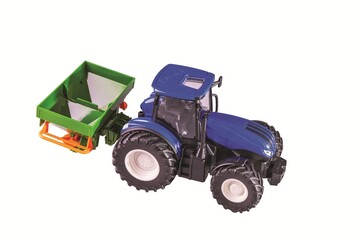 Fototapeta premium Close up view of blue radio controlled toy tractor with fertilizer spreader isolated on white background. Sweden.
