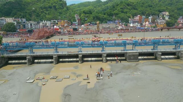 The majestic aerial view captures Haridwar's core: the sacred Har Ki Pauri ghat on the Ganges, the colossal Lord Shiva Statue, and the hilltop Mansa Devi Temple