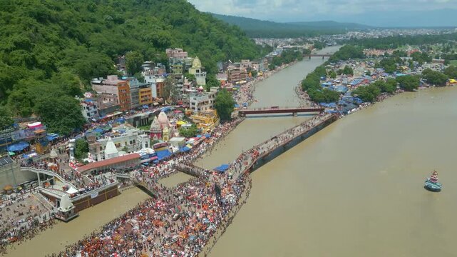 The majestic aerial view captures Haridwar's core: the sacred Har Ki Pauri ghat on the Ganges, the colossal Lord Shiva Statue, and the hilltop Mansa Devi Temple
