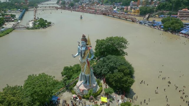 The majestic aerial view captures Haridwar's core: the sacred Har Ki Pauri ghat on the Ganges, the colossal Lord Shiva Statue, and the hilltop Mansa Devi Temple
