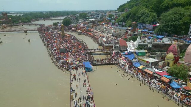The majestic aerial view captures Haridwar's core: the sacred Har Ki Pauri ghat on the Ganges, the colossal Lord Shiva Statue, and the hilltop Mansa Devi Temple