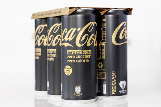 Milan, Italy - March 3, 2026: close up on black Coca-Cola cans on whute background.