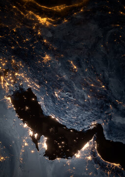 3D render of Strait of Hormuz and Iran at night from space. Illuminated Persian Gulf with UAE and Saudi Arabia city lights. Middle East map concept for news media, print cover and graphic design