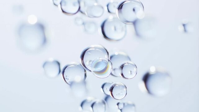 Floating water bubbles in a clear background. Represents purity, freshness, and the essence of hydration in various applications