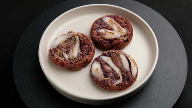 Young coconut Bha Bin (Thai coconut pancake) recipe with black glutinous rice flour.