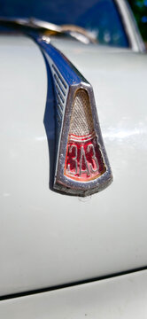 Saint Petersburg, Russia - May 23, 2026: ZAZ Zaporozhets car emblem detail featuring the number 1343 on a vintage vehicle with chrome accents and a white body