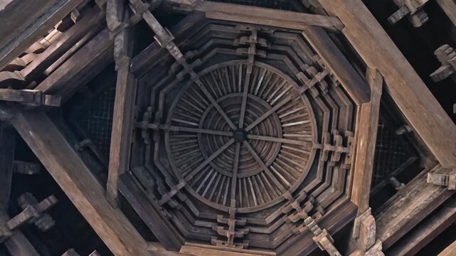 Intricate Wooden Temple Ceiling with Geometric Symmetry