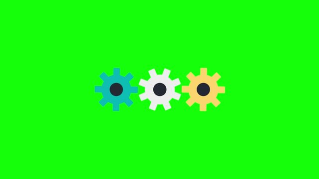 Three colorful gears rotating in sync on a green screen background
