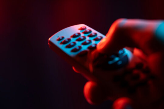 Hold remote control in hand 2