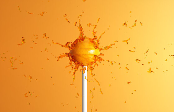 Lollipop with splash of juice on orange background. 3d-rendering
