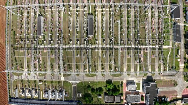 Aerial Top View of Electrical Substation and Power Grid Infrastructure