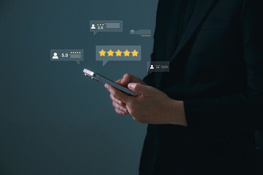 Customer feedback and rating concept with smartphone and digital five star review interface, user experience, online reputation, satisfaction score, client feedback, and service quality evaluation.