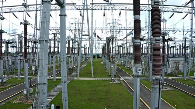 High Voltage Electrical Substation with Power Lines and Industrial Equipment