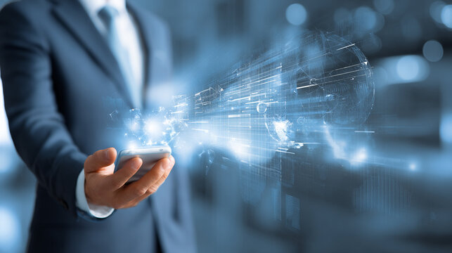 A businessman holds a smartphone, illustrating the convergence of technology and business. The image captures innovation, connectivity, and digital transformation in modern work.