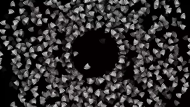 A seamless motion background of rotating white leaf-like shapes forming a circular pattern on black