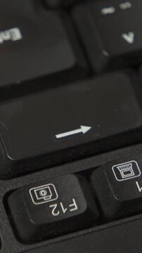Tapping backspace key close up macro