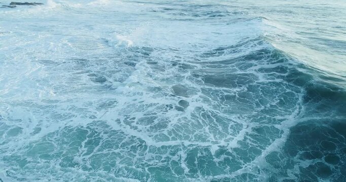 Large ocean wave forming and crashing in the open sea The Concept of environmental beauty