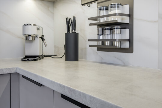 Interior of the modern luxure kitchen work area  in studio apartments in minimalistic style
