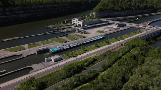 Barge enters lock on the Albert Canal near Ecluse de Lanaye on the border of Belgium and Netherlands