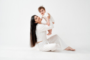 Fototapeta premium mother and baby, hugging and kissing, space and place for text, mother and child, maternal love