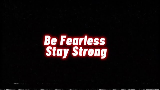 Inspirational motivational quote text animation be fearless stay strong on black background