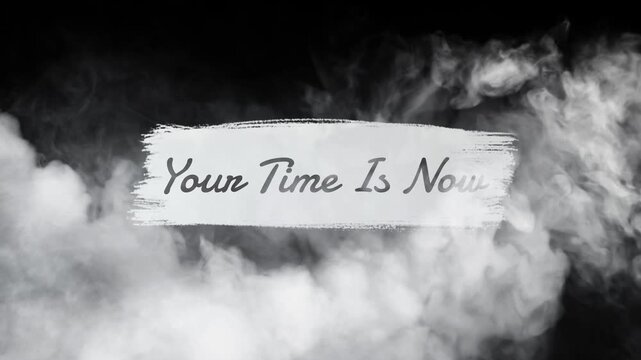Inspirational motivational quote 'your time is now' on dramatic smoke background
