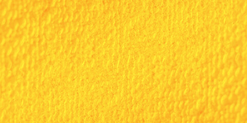 Bright yellow textured fabric background macro closeup of soft microfiber material vibrant cloth pattern full frame © Jharna Akter