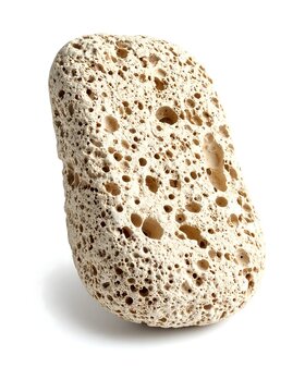 Porous Beige Pumice Stone Isolated on White Background
