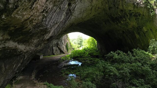 Drone Moving Toward Cave Entrance at Devetashka Cave, Bulgaria