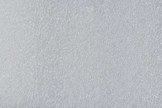 White foam packaging texture close up, soft protective material background for shipping, fragile delivery concepts, ecommerce banners and industrial packaging design