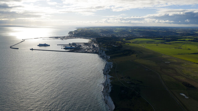 White cliffs of dover and port with ferries