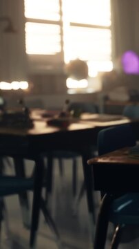 Students are seated at desks in a classroom. Sunlight enters through the windows, casting shadows. Classroom items and supplies are visible in the background, creating a school atmosphere.