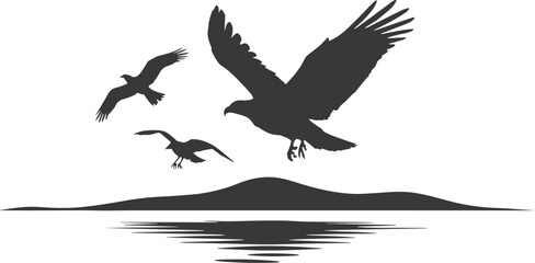 Fototapeta premium Eagle and Birds Silhouette Flying Over Water and Mountain