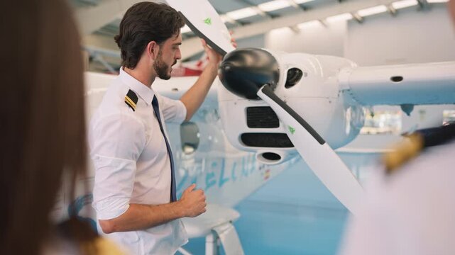 Aviation instructor explaining airplane propeller mechanics