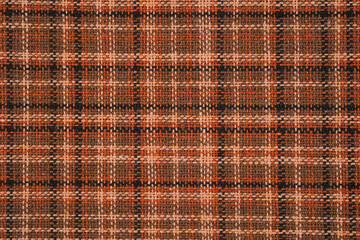 Fototapeta premium Brown tweed fabric with a plaid pattern