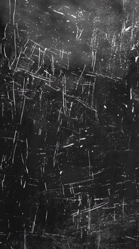 Abstract dark metal surface with deep scratches and weathered texture.