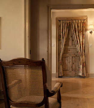 rustic interior with chair facing door