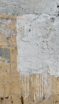 peeling paint texture background in beige, grey and white with copy space