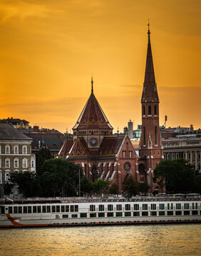 Neo gothic Protestant church in Budapest by the Danube at sunset. Budapest is the capital of Hungary.