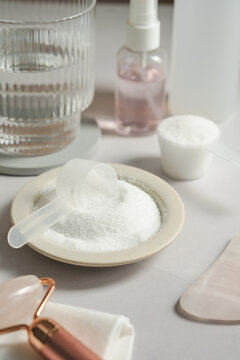 Collagen powder, skincare tools and products, wellness accessories