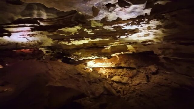 Dramatic illuminated cave ceiling and walls revealing intricate boxwork formations inside Wind Cave National Park