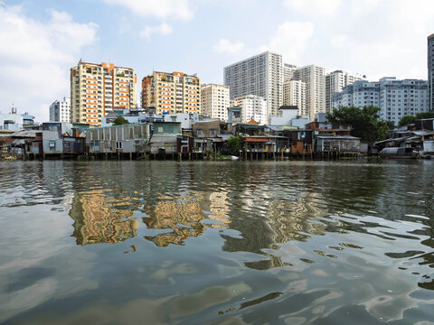 Informal Riverside Housing and High-Rise Apartments in Ho Chi Minh City, Vietnam