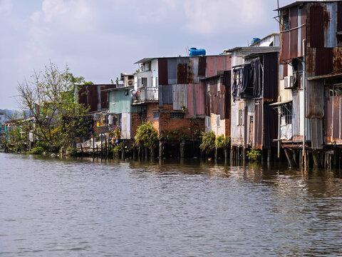 Informal Stilt Housing Along Canal in Ho Chi Minh City, Vietnam