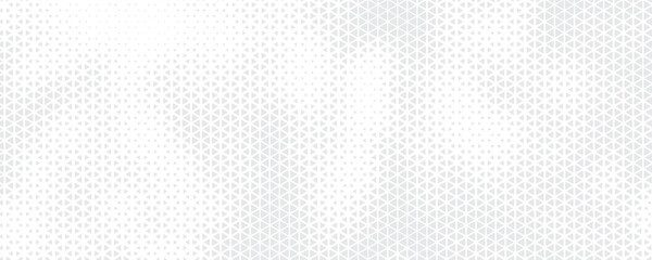 Obraz premium Abstract geometric halftone triangle pattern with soft beige and grey gradient wave effect for elegant background design.