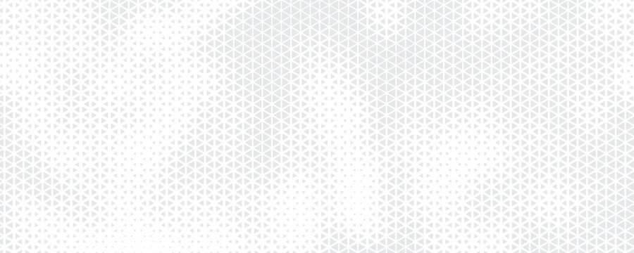 Abstract geometric halftone triangle pattern with soft beige and grey gradient wave effect for elegant background design.