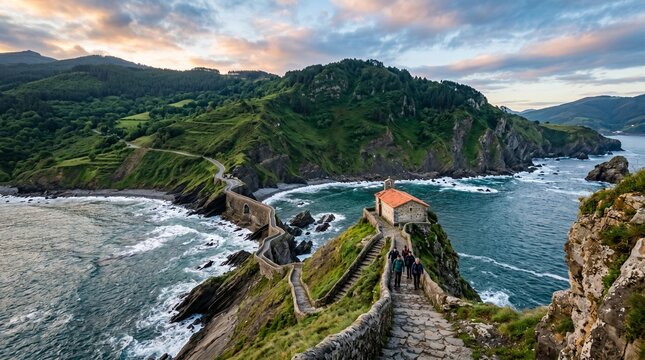 Breathtaking sunset view of San Juan de Gaztelugatxe in the Basque Country, Spain, featuring the iconic winding stone bridge leading to the historic hermitage on the rocky islet